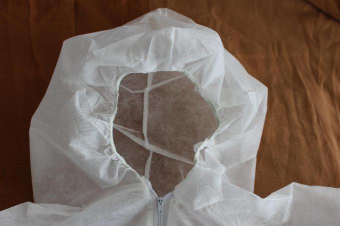 Combinaison protectrice jetable fiable pour l'hôpital/laboratoire/pièce propre